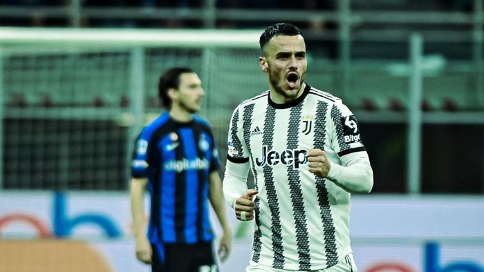 MILAN, ITALY - MARCH 19: Filip Kostic of Juventus celebrates after scoring a goal during the Italian Serie A football match FC Internazionale vs Juventus at San Siro Stadium in Milan, Italy on March 19, 2023. (Photo by Piero Cruciatti/Anadolu Agency via Getty Images)