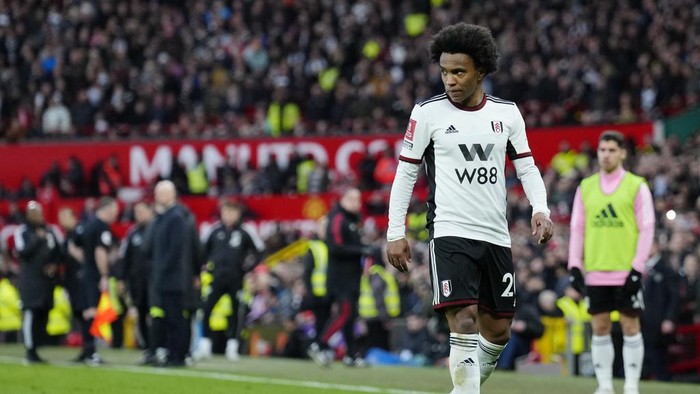 Fulhams Willian walks off after he was shown a red card during the English FA Cup quarterfinal soccer match between Manchester United and Fulham at the Old Trafford stadium in Manchester, England, Sunday, March 19, 2023. (AP Photo/Jon Super)