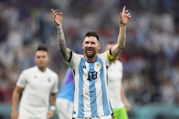 LUSAIL CITY, QATAR - DECEMBER 13:  Lionel Messi of Argentina celebrates the teams 3-0 victory in the FIFA World Cup Qatar 2022 semi final match between Argentina and Croatia at Lusail Stadium on December 13, 2022 in Lusail City, Qatar. (Photo by Clive Brunskill/Getty Images)
