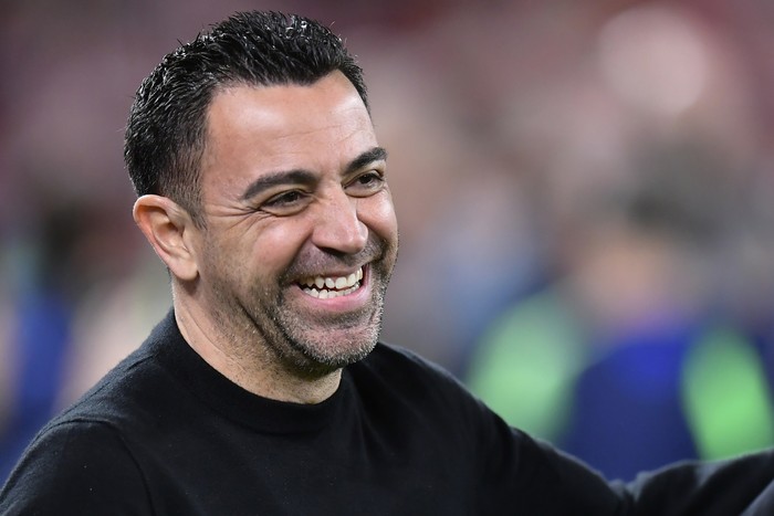 Barcelonas head coach Xavi Hernandez smiles before the Spanish La Liga soccer match between Athletic Club and Barcelona at the San Mames stadium in Bilbao, Spain, Sunday, March 12, 2023. (AP Photo/Alvaro Barrientos)