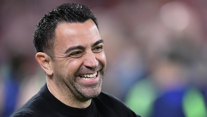 Barcelonas head coach Xavi Hernandez smiles before the Spanish La Liga soccer match between Athletic Club and Barcelona at the San Mames stadium in Bilbao, Spain, Sunday, March 12, 2023. (AP Photo/Alvaro Barrientos)
