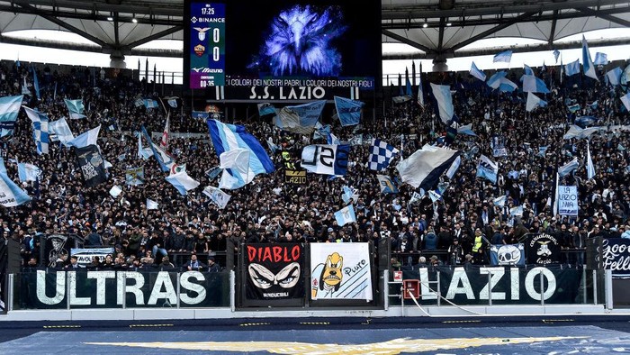 Lazio supporters cheer on during the Serie A football match between SS Lazio and AS Roma at Olimpico stadium. Rome (Italy), March 19th, 2023. (Photo by Elianton/Mondadori Portfolio via Getty Images)