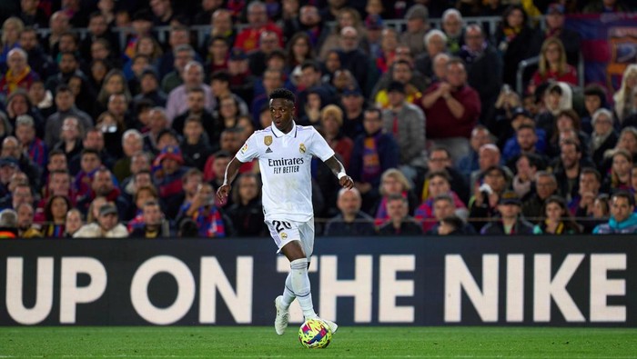 BARCELONA, SPAIN - MARCH 19: Vinicius Junior of Real Madrid in action during the LaLiga Santander match between FC Barcelona and Real Madrid CF at Spotify Camp Nou on March 19, 2023 in Barcelona, Spain. (Photo by Angel Martinez/Getty Images)
