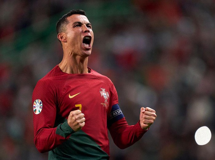 LISBON, PORTUGAL - MARCH 23:  Cristiano Ronaldo of Portugal celebrates after scoring his team's third goal during the UEFA EURO 2024 qualifying round group J match between Portugal and Liechtenstein at Estadio Jose Alvalade on March 23, 2023 in Lisbon, Portugal. (Photo by Jose Manuel Alvarez/Quality Sport Images/Getty Images)