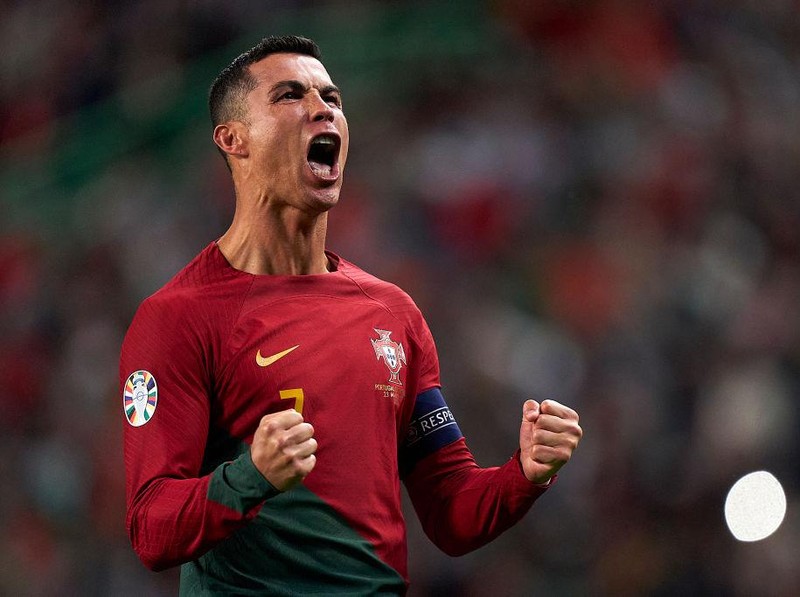 LISBON, PORTUGAL - MARCH 23:  Cristiano Ronaldo of Portugal celebrates after scoring his team's third goal during the UEFA EURO 2024 qualifying round group J match between Portugal and Liechtenstein at Estadio Jose Alvalade on March 23, 2023 in Lisbon, Portugal. (Photo by Jose Manuel Alvarez/Quality Sport Images/Getty Images)