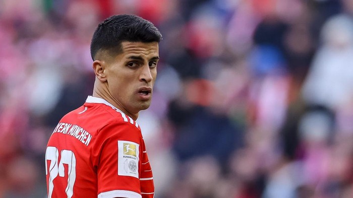 MUNICH, GERMANY - MARCH 11: Joao Cancelo of Bayern Muenchen looks on during the Bundesliga match between FC Bayern München and FC Augsburg at Allianz Arena on March 11, 2023 in Munich, Germany. (Photo by Roland Krivec/DeFodi Images via Getty Images)
