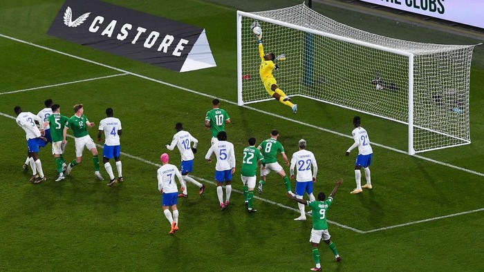 Dublin , Ireland - 27 March 2023; France goalkeeper Mike Maignan saves the header from Nathan Collins of Republic of Ireland in the closing moments of the UEFA EURO 2024 Championship Qualifier match between Republic of Ireland and France at the Aviva Stadium in Dublin. (Photo By Piaras Ó Mídheach/Sportsfile via Getty Images)