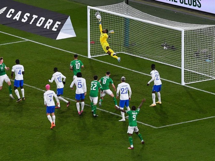 Dublin , Ireland - 27 March 2023; France goalkeeper Mike Maignan saves the header from Nathan Collins of Republic of Ireland in the closing moments of the UEFA EURO 2024 Championship Qualifier match between Republic of Ireland and France at the Aviva Stadium in Dublin. (Photo By Piaras Ó Mídheach/Sportsfile via Getty Images)