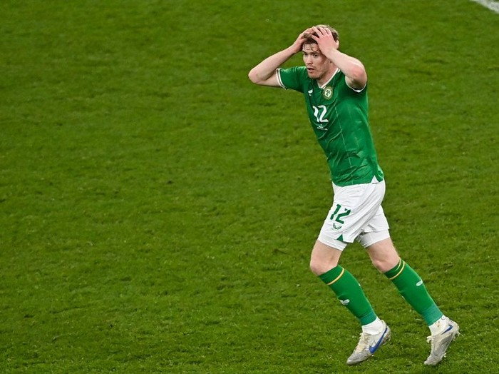 Dublin , Ireland - 27 March 2023; Nathan Collins of Republic of Ireland reacts after his header was saved by France goalkeeper Mike Maignan during the UEFA EURO 2024 Championship Qualifier match between Republic of Ireland and France at Aviva Stadium in Dublin. (Photo By Piaras Ó Mídheach/Sportsfile via Getty Images)