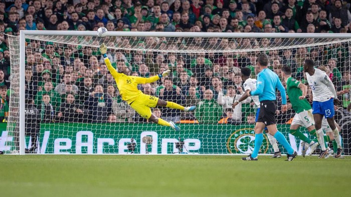 DUBLIN, IRELAND:  March 27:  Goalkeeper Mike Maignan #16 of France makes a fine save late in the game from a Nathan Collins #12 of the Republic of Ireland header during the Republic of Ireland V France, 2024 European Championship Qualifying, Group B match at Aviva Stadium on March 27, 2023, in Dublin, Ireland. (Photo by Tim Clayton/Corbis via Getty Images)