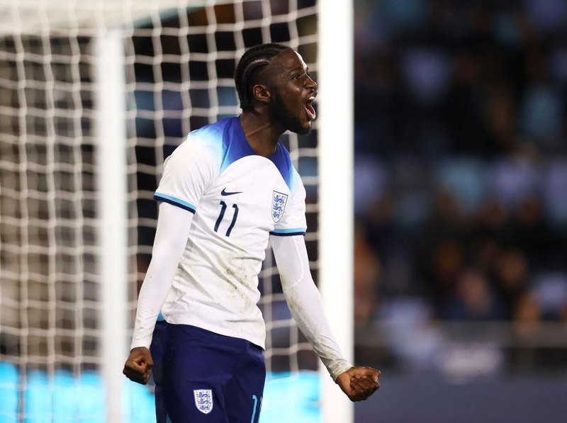 MANCHESTER, ENGLAND - MARCH 22: Samuel Iling-Junior of England celebrates after scoring the team's second goal during the International Friendly match between England and Germany at Manchester City Academy Stadium on March 22, 2023 in Manchester, England. (Photo by Naomi Baker - The FA/The FA via Getty Images)