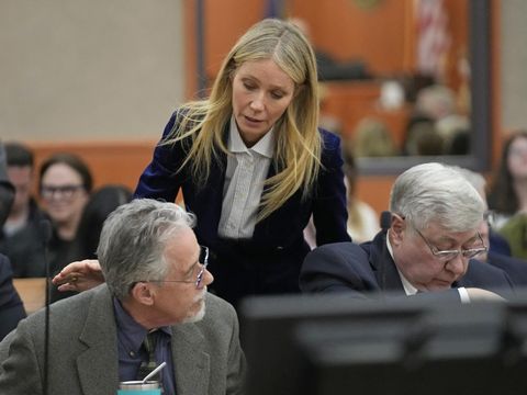 Gwyneth Paltrow speaks with retired optometrist Terry Sanderson,left, as she walks out of the courtroom following the reading of the verdict in their lawsuit trial, Thursday, March 30, 2023, in Park City, Utah. Paltrow won her court battle over a 2016 ski collision at a posh Utah ski resort after a jury decided Thursday that the movie star wasn’t at fault for the crash. (AP Photo/Rick Bowmer, Pool)