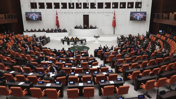 Turkish lawmakers vote in favor of Finlands bid to join NATO, late Thursday, March 30, 2023, at the parliament in Ankara, Turkey. All 276 lawmakers present voted unanimously in favor of Finlands bid, days after Hungarys parliament also endorsed Helsinkis accession.(AP Photo/Burhan Ozbilici)