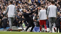 Ini reaksi kegembiraan Guardiola saat timnya menyamakan skor 1-1 lawan Liverpool. Foto: Action Images via Reuters/JASON CAIRNDUFF