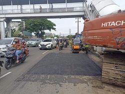 Lubang Besar di Jl Daan Mogot Jakbar Telah Diaspal