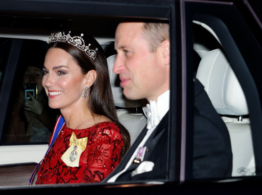 LONDON, UNITED KINGDOM - DECEMBER 06: (EMBARGOED FOR PUBLICATION IN UK NEWSPAPERS UNTIL 24 HOURS AFTER CREATE DATE AND TIME) Catherine, Princess of Wales (wearing the Lotus Flower Tiara) and Prince William, Prince of Wales depart after attending the annual Reception for Members of the Diplomatic Corps at Buckingham Palace on December 6, 2022 in London, England. This year's Reception for the Diplomatic Corp is the first hosted by King Charles III and the first since 2019 following a two year hiatus due to the COIVD-19 pandemic. (Photo by Max Mumby/Indigo/Getty Images)