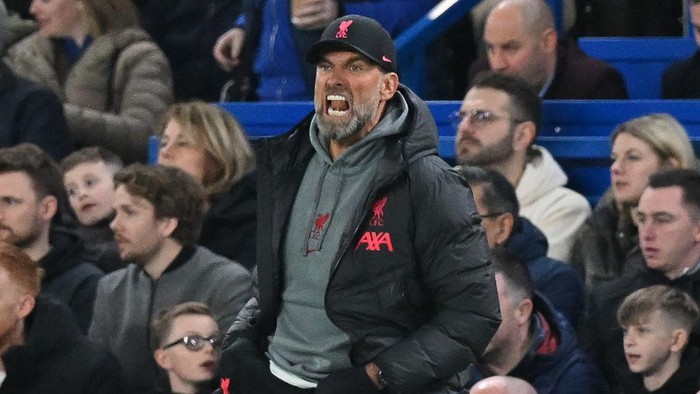 Liverpools German manager Jurgen Klopp gestures on the touchline during the English Premier League football match between Chelsea and Liverpool at Stamford Bridge in London on April 4, 2023. (Photo by Glyn KIRK / AFP) / RESTRICTED TO EDITORIAL USE. No use with unauthorized audio, video, data, fixture lists, club/league logos or live services. Online in-match use limited to 120 images. An additional 40 images may be used in extra time. No video emulation. Social media in-match use limited to 120 images. An additional 40 images may be used in extra time. No use in betting publications, games or single club/league/player publications. /  (Photo by GLYN KIRK/AFP via Getty Images)