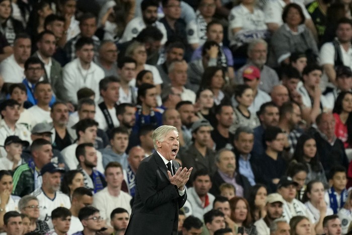 Real Madrids head coach Carlo Ancelotti reacts during a Spanish La Liga soccer match between Real Madrid and Villarreal at the Santiago Bernabeu stadium in Madrid, Saturday, April 8, 2023. (AP Photo/Jose Breton)