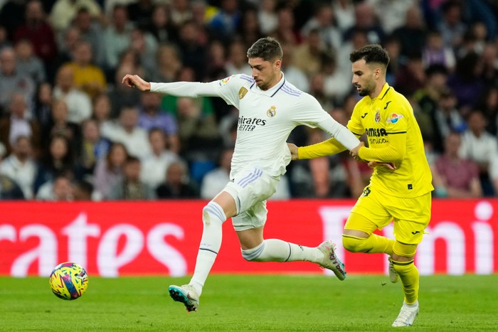 Federico Valverde central midfield of Real Madrid and Uruguay and Alex Baena left winger of Villarreal and Spain compete for the ball during the La Liga Santander match between Real Madrid CF and Villarreal CF at Estadio Santiago Bernabeu on April 8, 2023 in Madrid, Spain. (Photo by Jose Breton/Pics Action/NurPhoto via Getty Images)