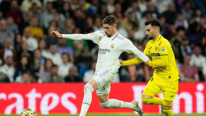 Federico Valverde central midfield of Real Madrid and Uruguay and Alex Baena left winger of Villarreal and Spain compete for the ball during the La Liga Santander match between Real Madrid CF and Villarreal CF at Estadio Santiago Bernabeu on April 8, 2023 in Madrid, Spain. (Photo by Jose Breton/Pics Action/NurPhoto via Getty Images)
