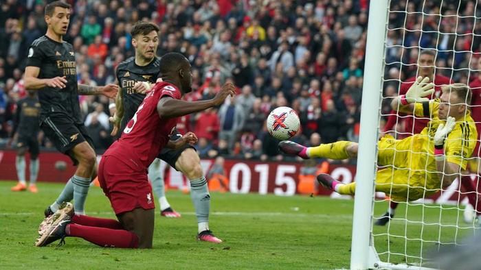 Arsenal goalkeeper Aaron Ramsdale saves from Liverpools Ibrahima Konate late in the game during the Premier League match at Anfield, Liverpool. Picture date: Sunday April 9, 2023. (Photo by Nick Potts/PA Images via Getty Images)