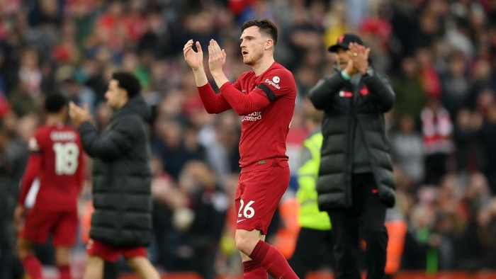 LIVERPOOL, ENGLAND - APRIL 09: Andrew Robertson of Liverpool applauds the fans after the Premier League match between Liverpool FC and Arsenal FC at Anfield on April 09, 2023 in Liverpool, England. (Photo by Shaun Botterill/Getty Images)