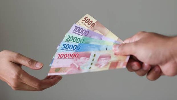 Bolehkah bayar zakat fitrah pakai uang/ Foto: iStockphoto