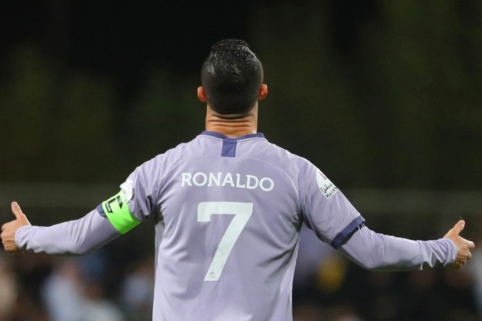 TOPSHOT - Nassrs Portuguese forward Cristiano Ronaldo reacts to a missed chance during the Saudi Pro League football match between Al-Fayha and Al-Nassr at the al-Majmaah stadium in the city of al-Majmaah on April 9, 2023. (Photo by Abdulaziz ALNOMAN / AFP) (Photo by ABDULAZIZ ALNOMAN/AFP via Getty Images)
