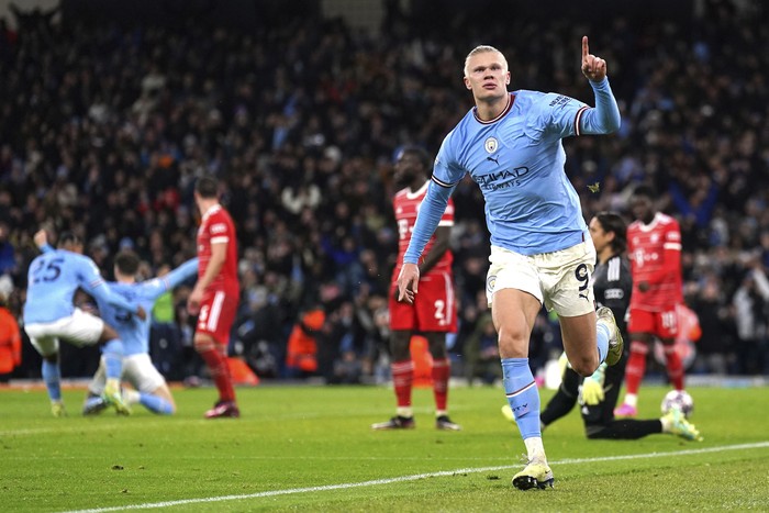 Manchester Citys Erling Haaland celebrates after scoring his sides third goal during the Champions League quarterfinal, first leg, soccer match between Manchester City and Bayern Munich at the Etihad stadium in Manchester, England, Tuesday, April 11, 2023. (Tim Goode/PA via AP)