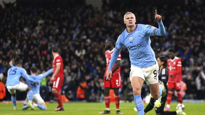 Manchester Citys Erling Haaland celebrates after scoring his sides third goal during the Champions League quarterfinal, first leg, soccer match between Manchester City and Bayern Munich at the Etihad stadium in Manchester, England, Tuesday, April 11, 2023. (Tim Goode/PA via AP)