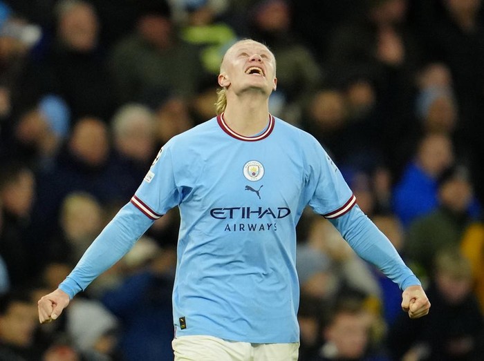 Manchester City's Erling Haaland celebrates at the end of the Champions League quarterfinal, first leg, soccer match between Manchester City and Bayern Munich at the Etihad stadium in Manchester, England, Tuesday, April 11, 2023. Manchester City won 3-0. (AP Photo/Jon Super)
