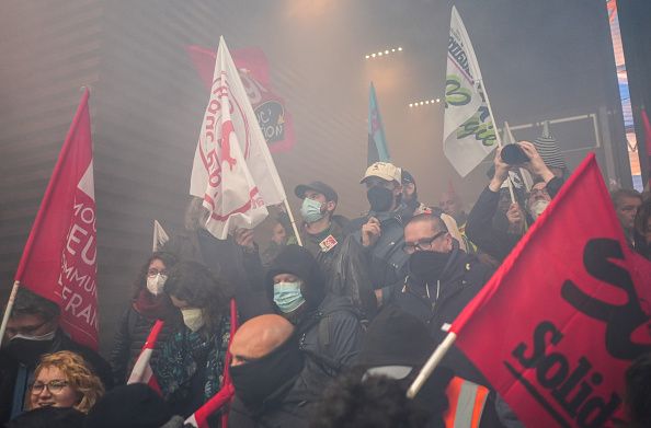 Protestors gain entry inside the LVMH Moet Hennessy Louis Vuitton SE headquarters during a demonstration against pension reform in central Paris, France, on Thursday, April 13, 2023. French unions are holding strikes and protests on Thursday against President Emmanuel Macron's pension reform, seeking to maintain pressure on the government before a ruling on the law's constitutionality. Photographer: Nathan Laine/Bloomberg via Getty Images