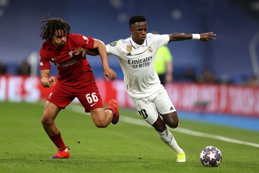 MADRID, SPAIN - APRIL 12: Vinicius Junior of Real Madrid CF battle for the ball with Reece James  of Chelsea FC during the UEFA Champions League quarterfinal first leg match between Real Madrid and Chelsea FC at Estadio Santiago Bernabeu on April 12, 2023 in Madrid, Spain. (Photo by Diego Souto/Quality Sport Images/Getty Images)