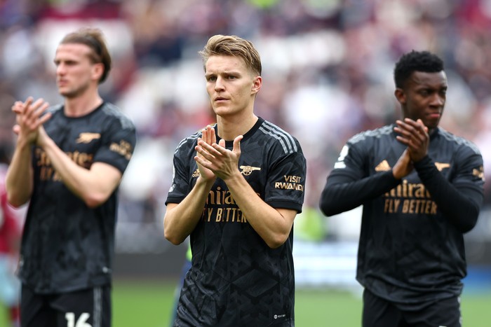 LONDON, ENGLAND - APRIL 16: Martin Odegaard of Arsenal applauds the fans after the Premier League match between West Ham United and Arsenal FC at London Stadium on April 16, 2023 in London, England. (Photo by Chloe Knott - Danehouse/Getty Images)
