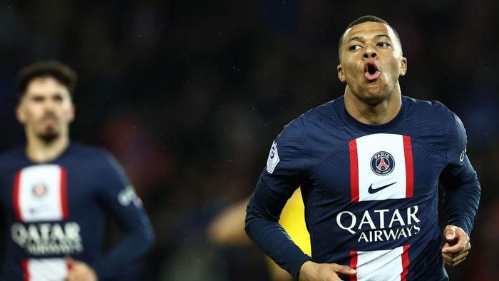 Paris Saint-Germains French forward Kylian Mbappe celebrates after scoring his teams first goal during the French L1 football match between Paris Saint-Germain (PSG) and Lens (RCL) at the Parc des Princes in Paris, on April 15, 2023. (Photo by Anne-Christine POUJOULAT / AFP) (Photo by ANNE-CHRISTINE POUJOULAT/AFP via Getty Images)
