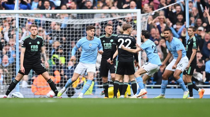 MANCHESTER, ENGLAND - APRIL 15: John Stones of Manchester City celebrates after scoring the teams first goal  during the Premier League match between Manchester City and Leicester City at Etihad Stadium on April 15, 2023 in Manchester, England. (Photo by Stu Forster/Getty Images)