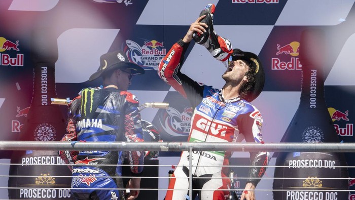 Alex Rins menang dii MotoGP AS, akhiri puasa Honda. (Foto: AP/Darren Abate) Alex Rins menang dii MotoGP AS, akhiri puasa Honda. (Foto: AP/Darren Abate)