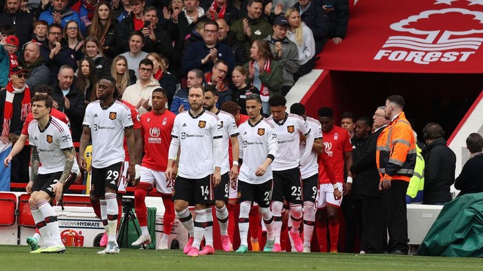 NOTTINGHAM, ENGLAND - APRIL 16: Victor Lindelof, Aaron Wan-Bissaka, Christian Eriksen of Manchester United walks out ahead of the Premier League match between Nottingham Forest and Manchester United at City Ground on April 16, 2023 in Nottingham, England. (Photo by Matthew Peters/Manchester United via Getty Images)