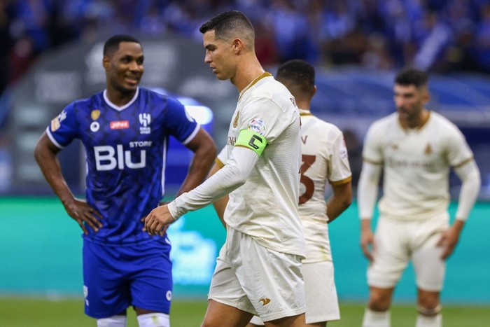 Nassrs Portuguese forward Cristiano Ronaldo (C) reacts during the Saudi Pro League football match between Al-Hilal and Al-Nassr at the Prince Faisal Bin Fahd stadium in the capital Riyadh on April 18, 2023. (Photo by Fayez NURELDINE / AFP) (Photo by FAYEZ NURELDINE/AFP via Getty Images)