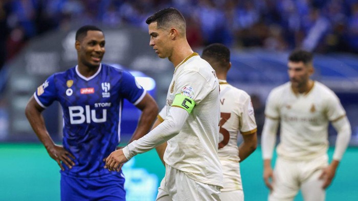Nassrs Portuguese forward Cristiano Ronaldo (C) reacts during the Saudi Pro League football match between Al-Hilal and Al-Nassr at the Prince Faisal Bin Fahd stadium in the capital Riyadh on April 18, 2023. (Photo by Fayez NURELDINE / AFP) (Photo by FAYEZ NURELDINE/AFP via Getty Images)