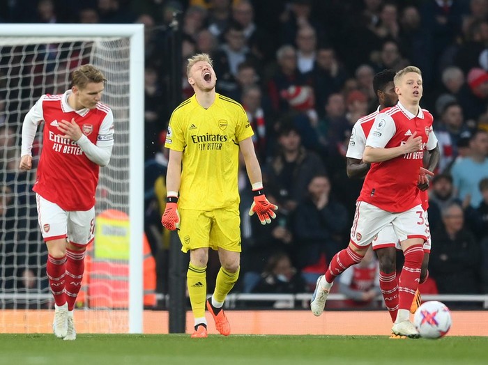 LONDON, ENGLAND - APRIL 21: Aaron Ramsdale of Arsenal reacts after conceding their sides first goal scored by Carlos Alcaraz of Southampton (not pictured) during the Premier League match between Arsenal FC and Southampton FC at Emirates Stadium on April 21, 2023 in London, England. (Photo by Shaun Botterill/Getty Images)