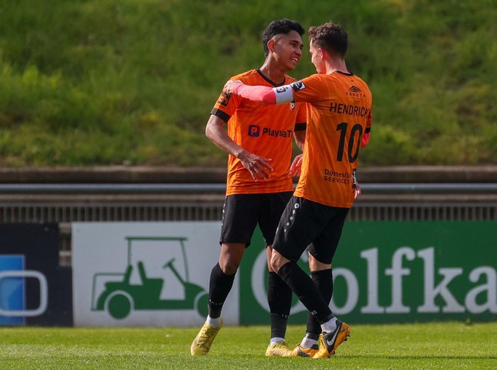 Deinzes Ferdinan Marselino celebrates after scoring during a soccer match between KMSK Deinze and RE Virton, Saturday 22 April 2023 in Deinze, on day 8 of the Relegation Play-offs of the 2022-2023 Challenger Pro League 1B second division of the Belgian championship. BELGA PHOTO VIRGINIE LEFOUR (Photo by VIRGINIE LEFOUR / BELGA MAG / Belga via AFP) (Photo by VIRGINIE LEFOUR/BELGA MAG/AFP via Getty Images)