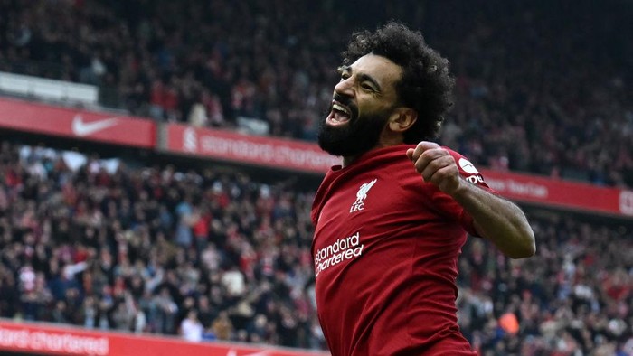 Liverpools Egyptian striker Mohamed Salah celebrates after scoring their third goal during the English Premier League football match between Liverpool and Nottingham Forest at Anfield in Liverpool, north west England on April 22, 2023. (Photo by Paul ELLIS / AFP) / RESTRICTED TO EDITORIAL USE. No use with unauthorized audio, video, data, fixture lists, club/league logos or live services. Online in-match use limited to 120 images. An additional 40 images may be used in extra time. No video emulation. Social media in-match use limited to 120 images. An additional 40 images may be used in extra time. No use in betting publications, games or single club/league/player publications. /  (Photo by PAUL ELLIS/AFP via Getty Images)