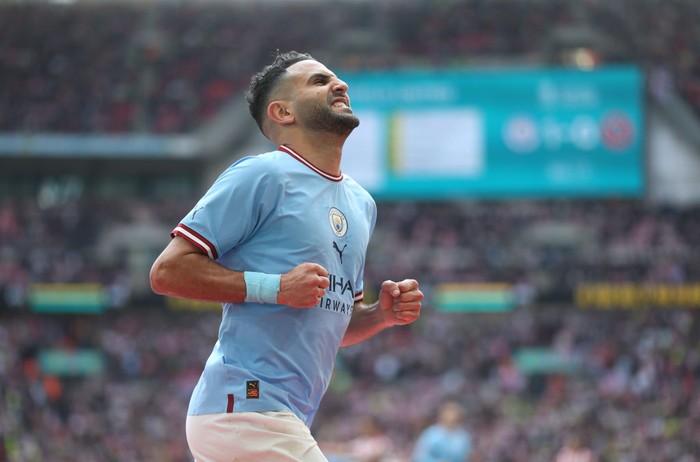 LONDON, ENGLAND - APRIL 22: Manchester Citys Riyad Mahrez celebrates scoring his sides second goal during The Emirates FA Cup Semi-Final match between Manchester City and Sheffield United at Wembley Stadium on April 22, 2023 in London, England. (Photo by Rob Newell - CameraSport via Getty Images)