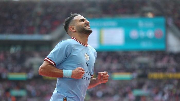 LONDON, ENGLAND - APRIL 22: Manchester Citys Riyad Mahrez celebrates scoring his sides second goal during The Emirates FA Cup Semi-Final match between Manchester City and Sheffield United at Wembley Stadium on April 22, 2023 in London, England. (Photo by Rob Newell - CameraSport via Getty Images)