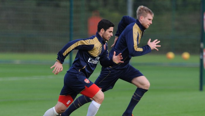 ST ALBANS, ENGLAND - NOVEMBER 20: (L-R) Mikel Arteta and Per Mertesacker of Arsenal during a training session at London Colney on November 20, 2015 in St Albans, England. (Photo by Stuart MacFarlane/Arsenal FC via Getty Images)