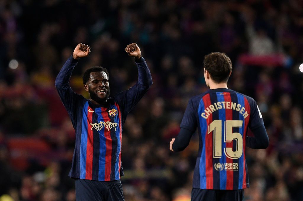 Barcelona's Ivorian midfielder Franck Kessie (L) and Barcelona's Danish defender Andreas Christensen celebrate at the end of the Spanish league football match between FC Barcelona and Real Madrid CF at the Camp Nou stadium in Barcelona on March 19, 2023. (Photo by Josep LAGO / AFP) (Photo by JOSEP LAGO/AFP via Getty Images)