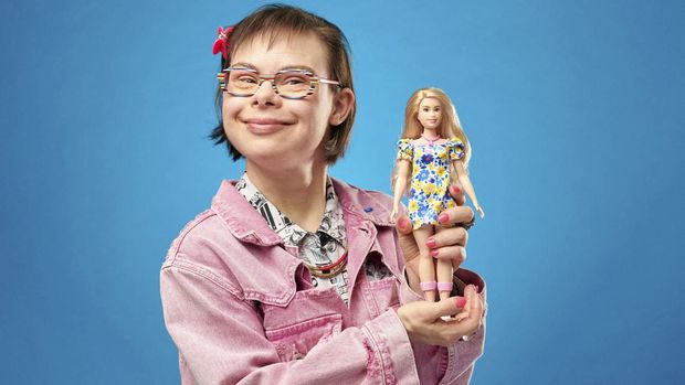 French City Counsellor & Author Eleonore Laloux holds the new Barbie doll with Down's syndrome, in Paris, France April 19, 2023. Mattel/Matthieu Suprin/Handout via REUTERS