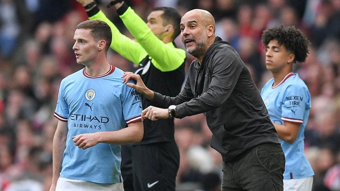 LONDON, ENGLAND - APRIL 22: Josep Guardiola manager of Manchester City and Sergio Gomez of Manchester City during FA Cup Semi Final match between Manchester City and Sheffield United at Wembley Stadium on April 22, 2023 in London, England. (Photo by MB Media/Getty Images)