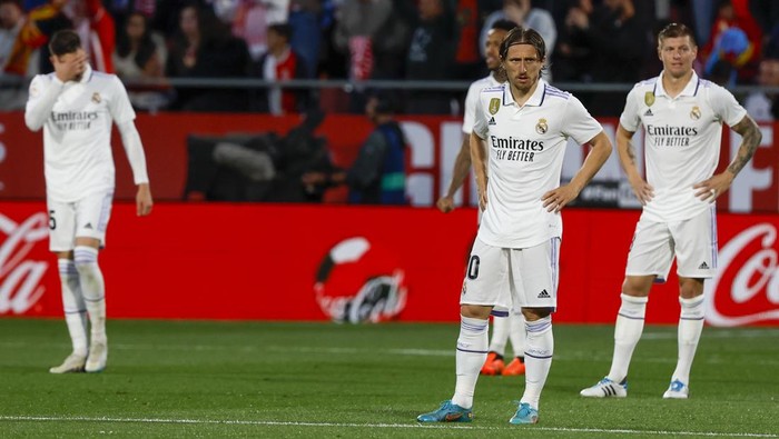 Real Madrid players react during a Spanish La Liga soccer match between Girona and Real Madrid, at the Montilivi stadium in Girona, Spain, Tuesday, April 25, 2023. (AP Photo/Joan Monfort)